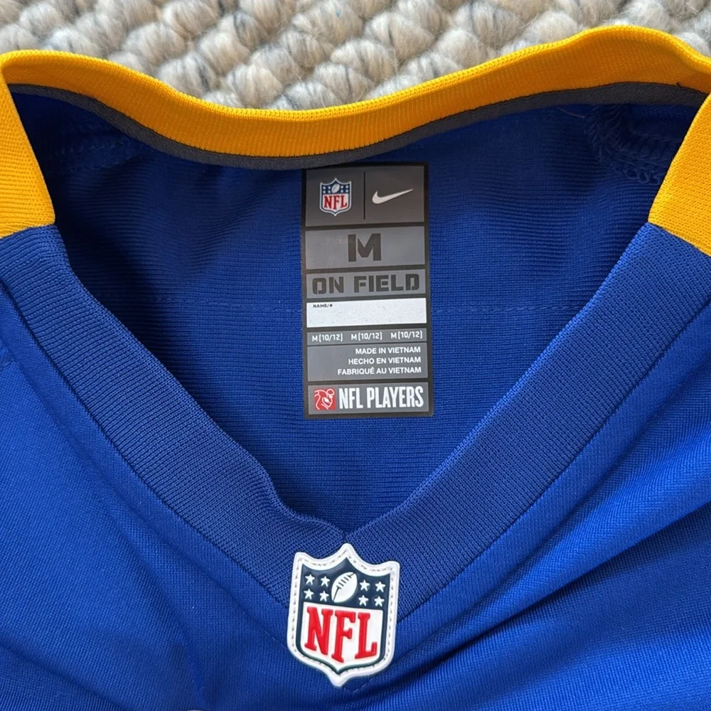 NWT Nike NFL Youth Boys On Field Medium Blue Gold Colors Short‎ Sleeve Jersey.